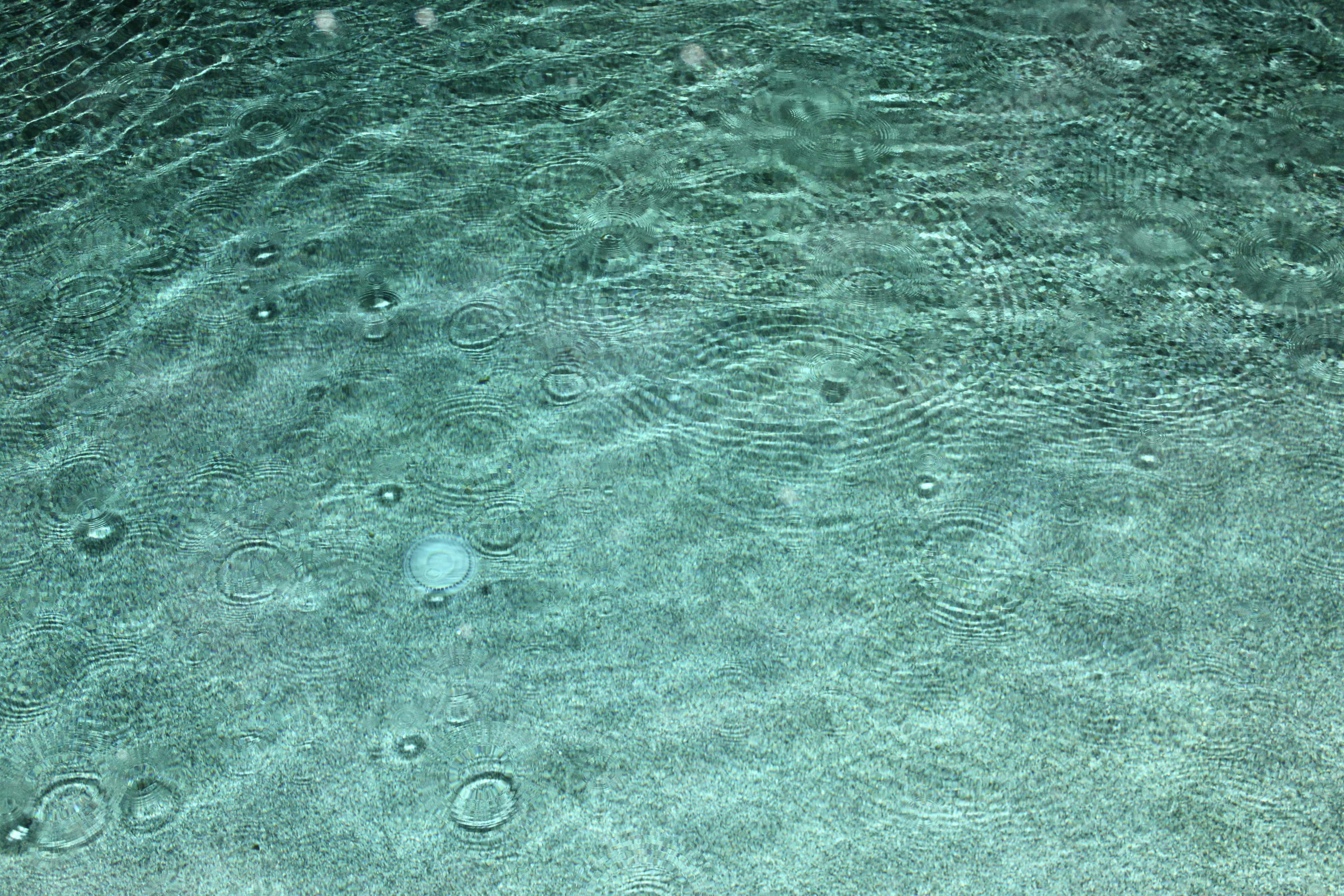 Rain in the pool by Jez Braithwaite