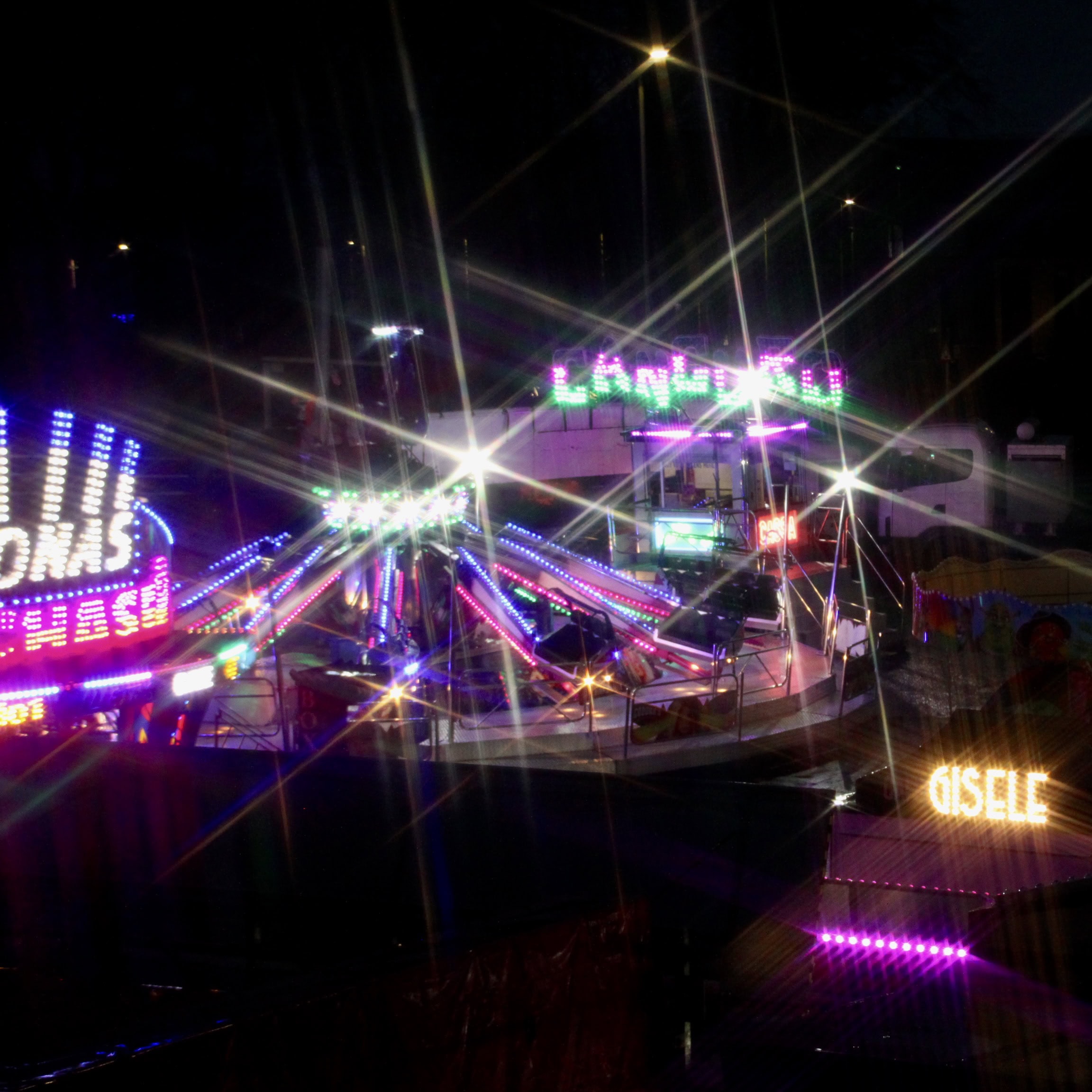 Fairground lights by Jez Braithwaite