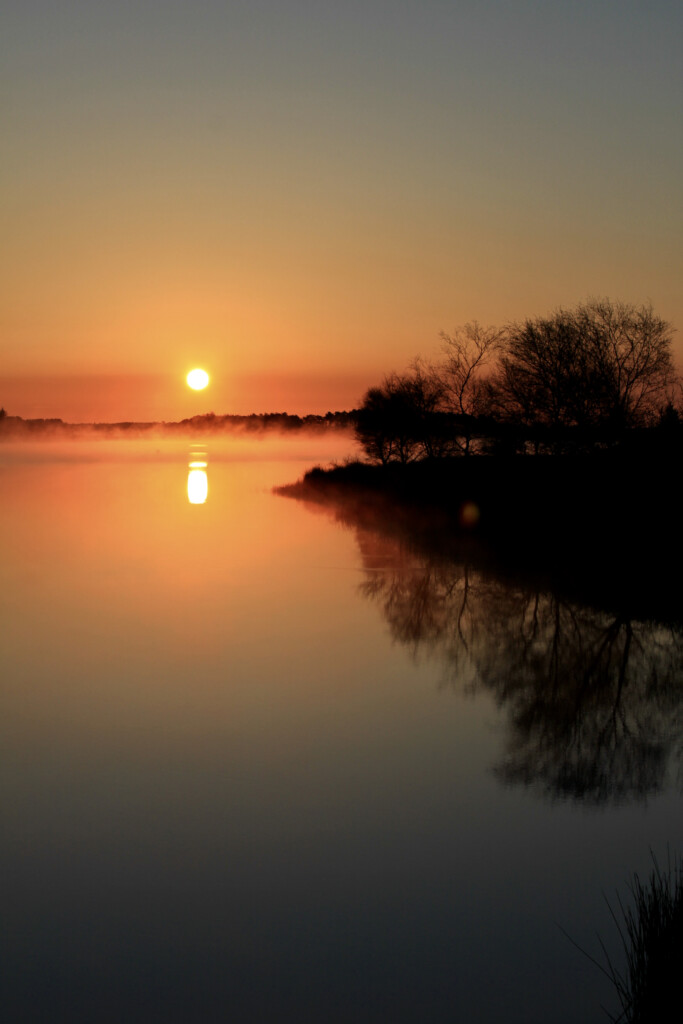 Sunrise reflections at Fannyside Lochs