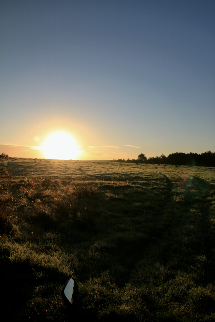 Sun clearing the hilltop