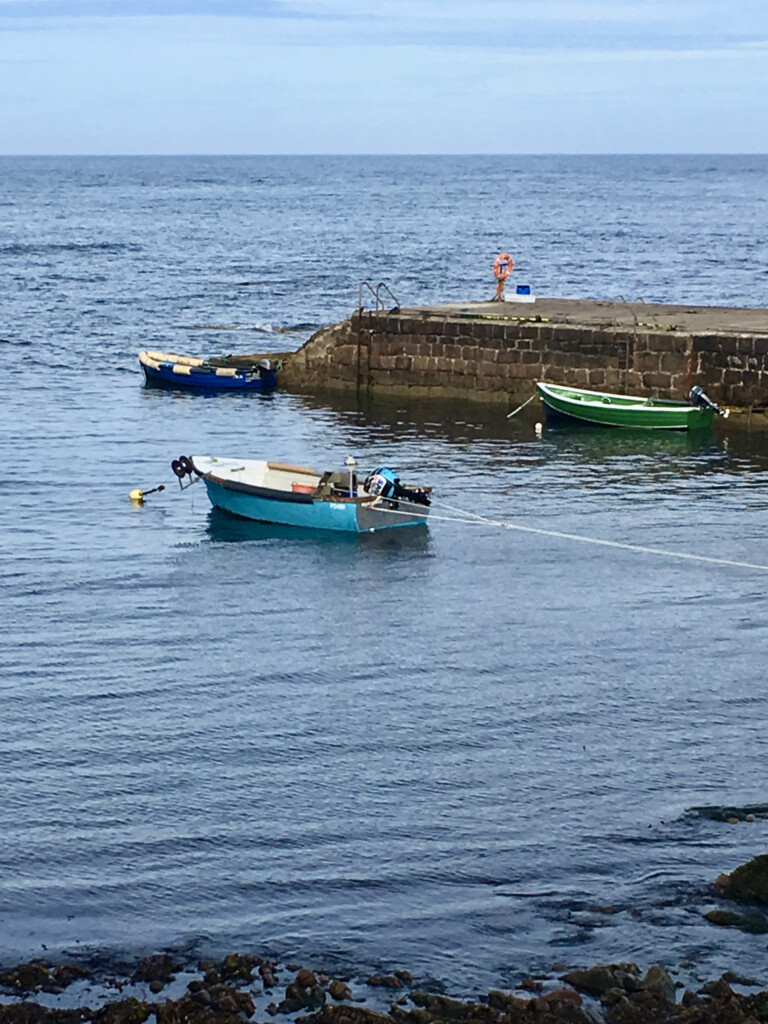 Teal fishing boat at Buchanhaven