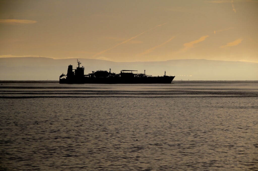 Ship silhouetted on the Firth of Forth