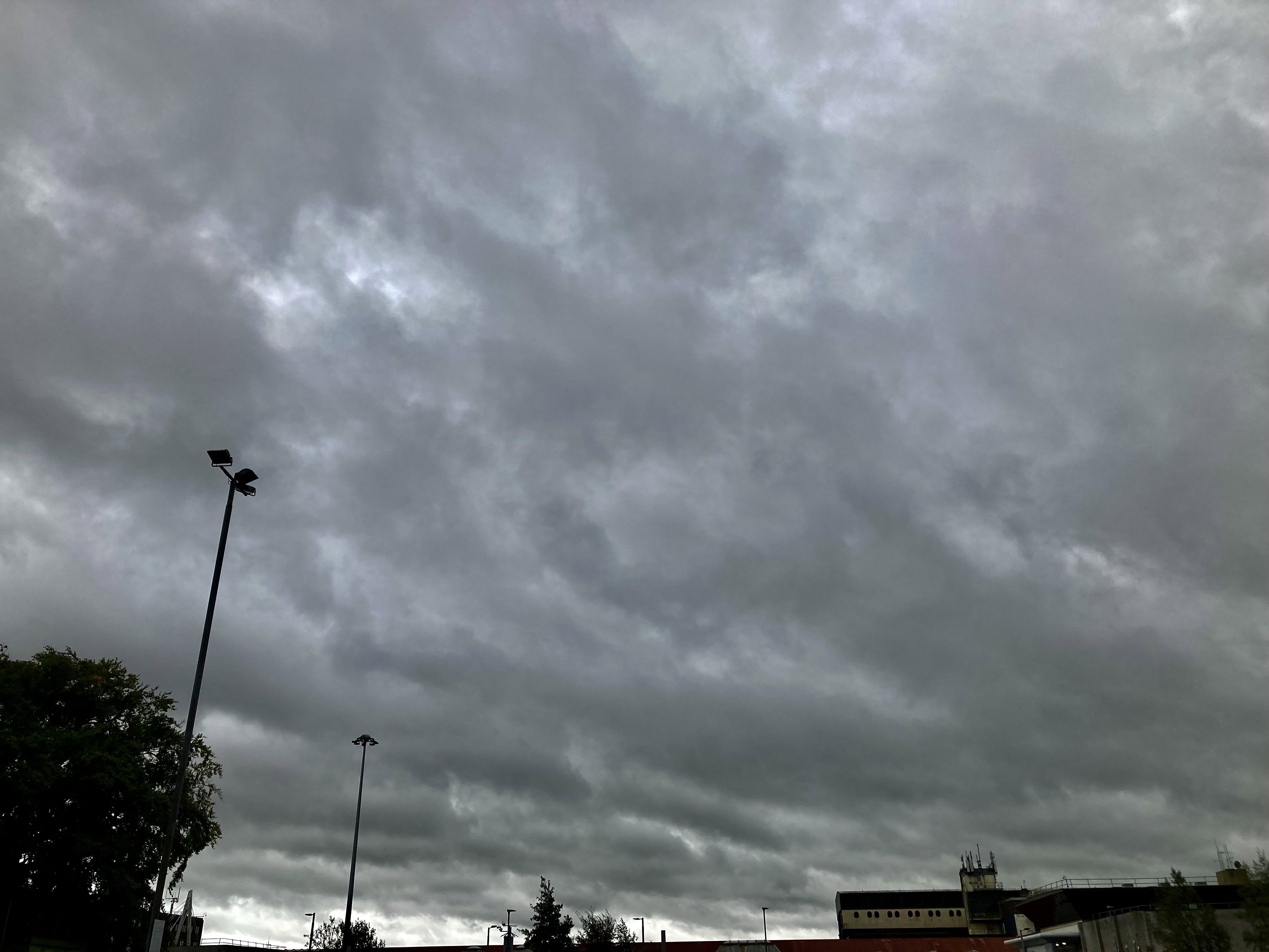 Grey Clouds Race Across The Sky